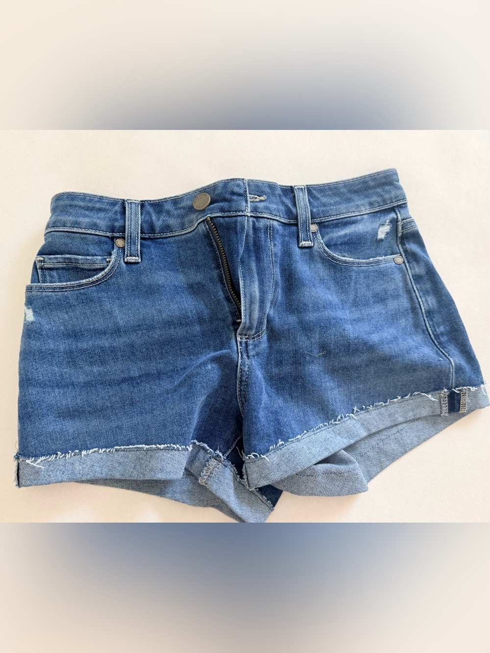 PAIGE Distressed Blue Denim Rolled-Hem Shorts